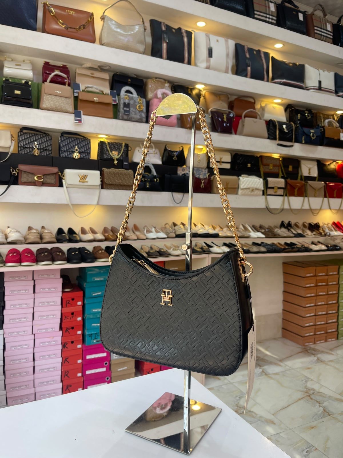 Tommy Hilfiger Black Embossed Hobo Bag With Gold Chain Strap